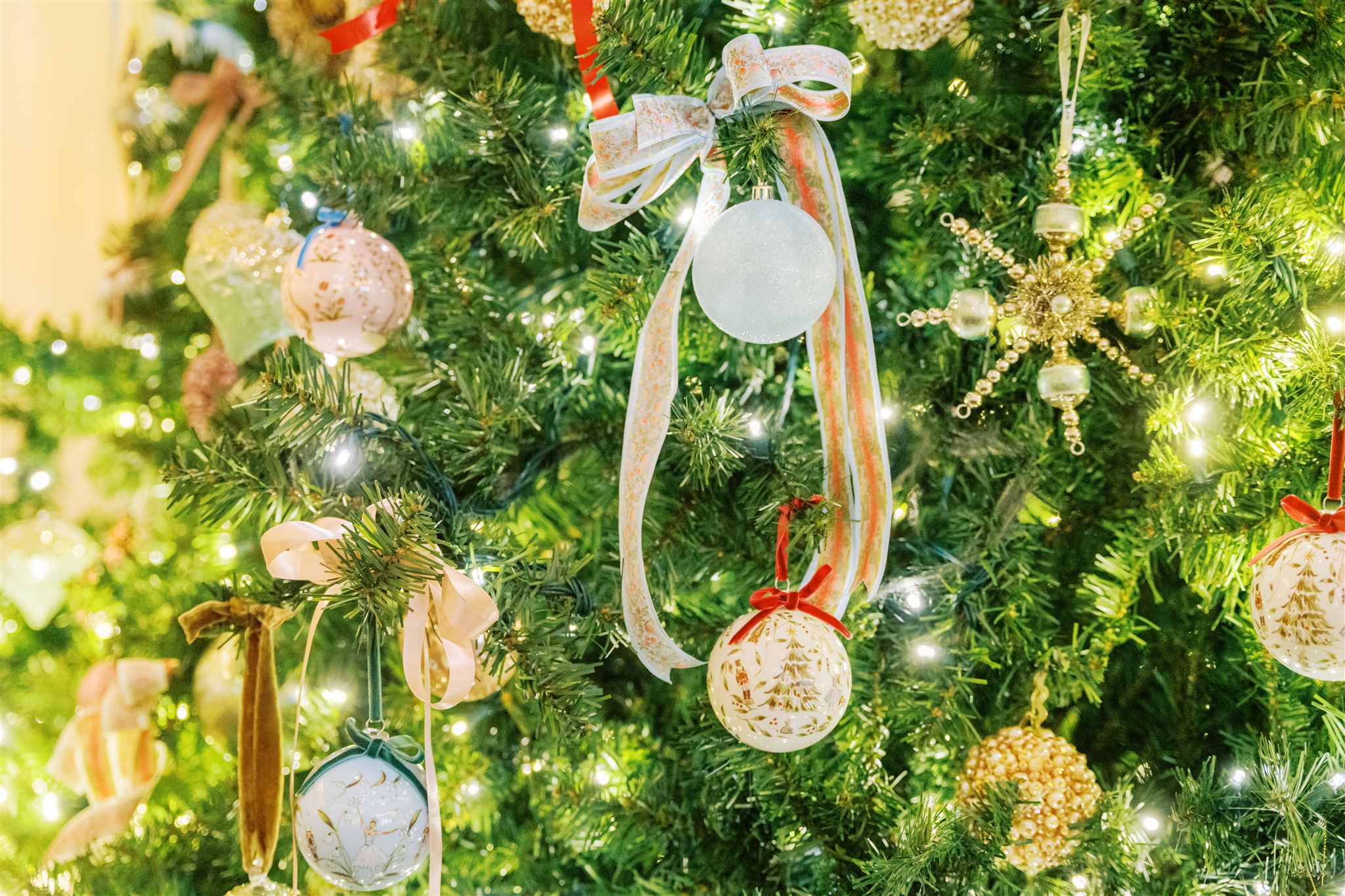 Over The Moon x St. Regis Atlanta Christmas Tree Nutcracker. Riley Sheehey Ornaments